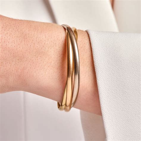 trinity bracelet by cartier